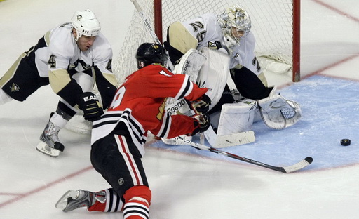 Rob Scuderi, Jonathan Toews, Marc-Andre Fleury