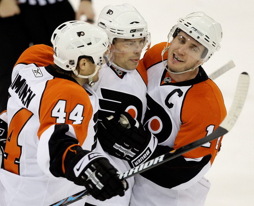 Kimmo Timonen, Darroll Powe, Brad Richards