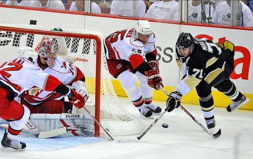 Evgeni Malkin, Joni Pitkanen, Cam Ward