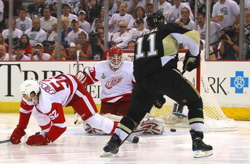 Jonathan Ericsson, Chris Osgood, Jordan Staal