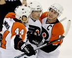 Kimmo Timonen, Darroll Powe, Brad Richards