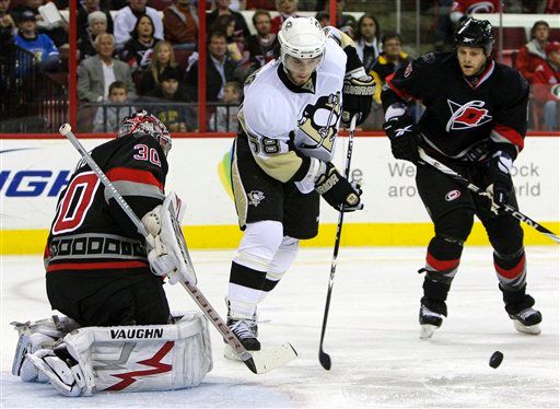 Cam Ward, Kris Letang, Tim Gleason