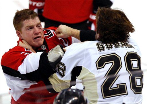 Chris Neil, Eric Godard