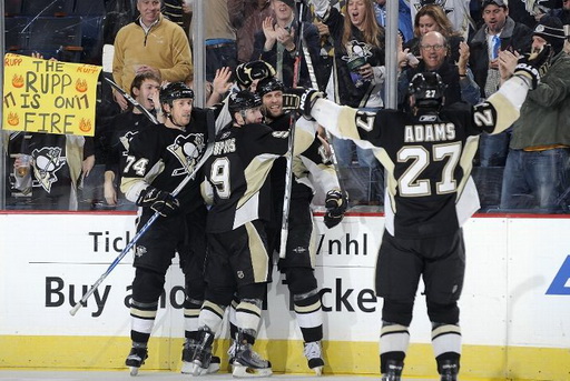 Jay McKee, Pascal Dupuis, Michael Rupp, Craig Adams