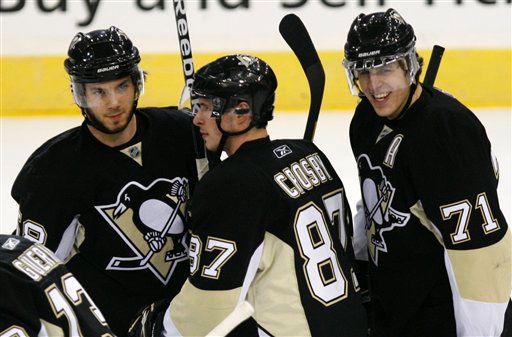 Kristopher Letang, Sidney Crosby, Evgeni Malkin