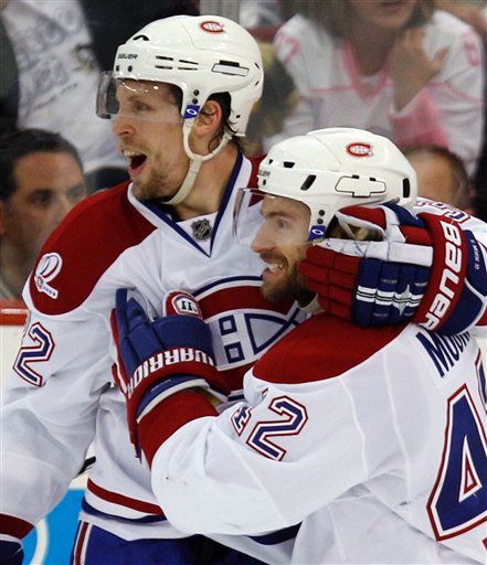 Travis Moen, Dominic Moore