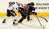 Pascal Dupuis, Chad Larose