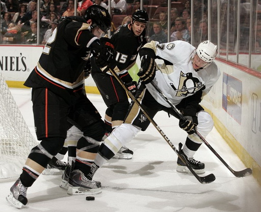 Toni Lydman, Ryan Getzlaf, Paul Martin