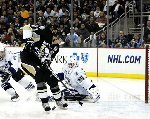 Evgeni Malkin, Dwayne Roloson