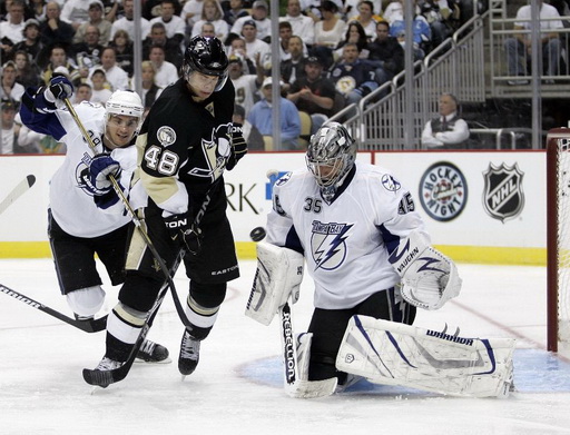 Mike Lundin, Tyler Kennedy, Dwayne Roloson