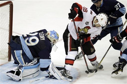 Marc-Andre Fleury, Zenon Konopka, Craig Adams