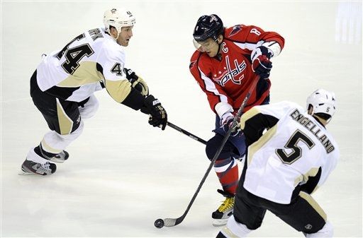 Brooks Orpik, Alexander Ovechkin, Deryk Engelland