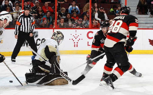 Brent Johnson, Jason Spezza, Zenon Konopka