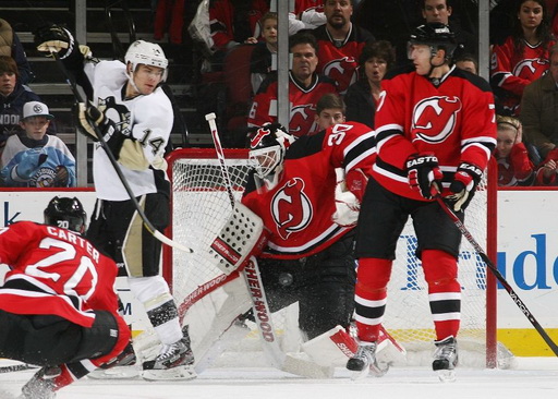 Ryan Carter, Chris Kunitz, Martin Brodeur, Henrik Tallinder