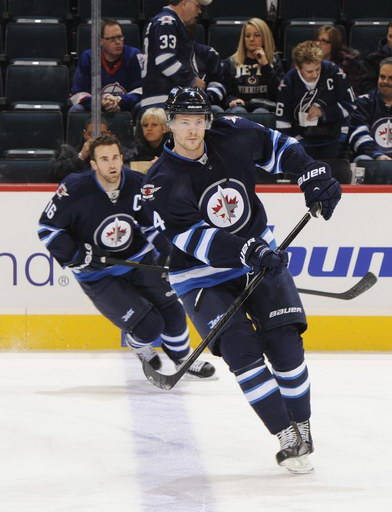 Andrew Ladd, Paul Postma