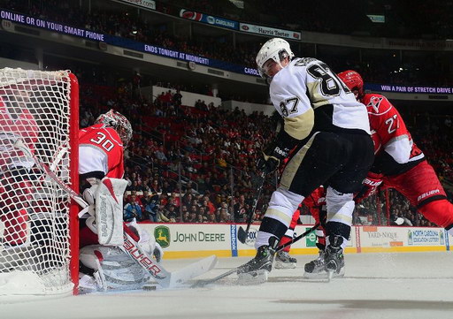 Cam Ward, Sidney Crosby, Justin Faulk