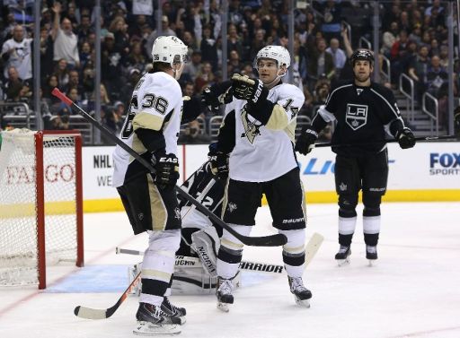 Jussi Jokinen, Chris Kunitz, Willie Mitchell