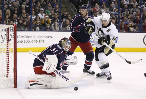 Curtis McElhinney, Jack Johnson, Chris Kunitz