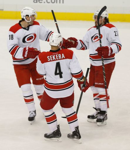 Radek Dvořák, Andrej Sekera, Justin Faulk